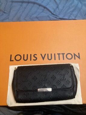 Louis Vuitton Black Monogram-Embossed Leather Clutch Wristlet